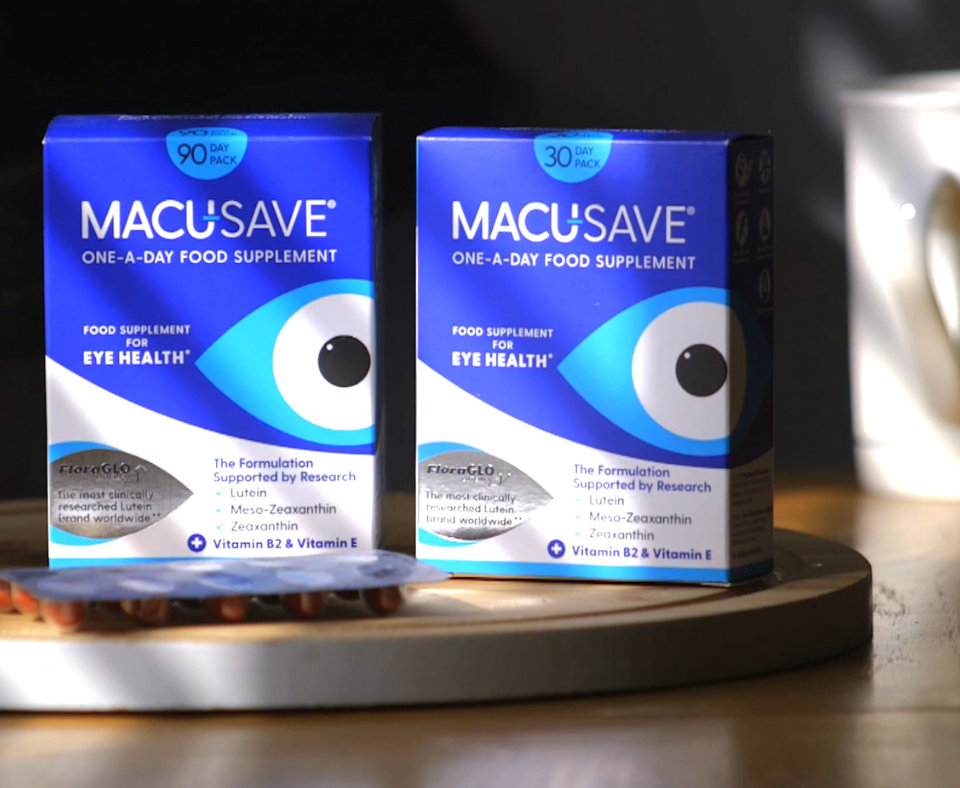 Two boxes of MacuSave eye health supplements on a wooden surface.