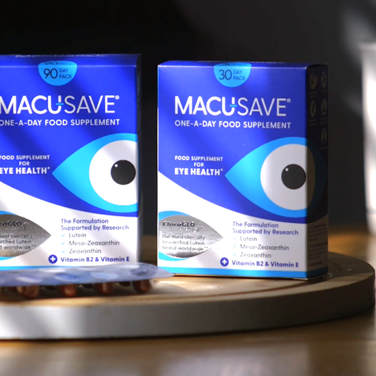 Two boxes of MacuSave eye health supplements on a wooden surface.